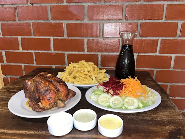 Ascua pollos y parrillas