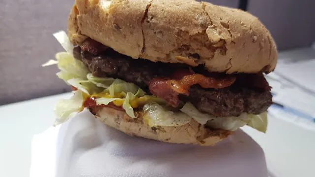 Manhattans Hand-made Burgers.