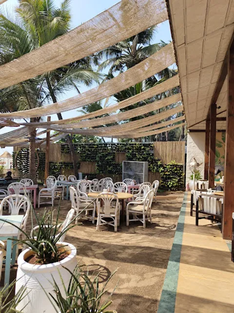 Tomatos | Seaside Restaurant in Morjim, Goa