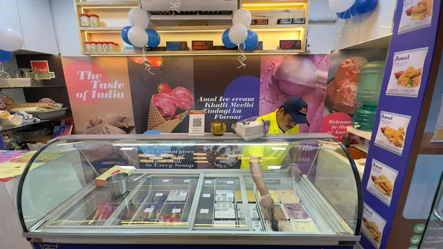 Amul Ice cream Parlour and Dairy Products (Scoops and Straw + Burgers and Fries)