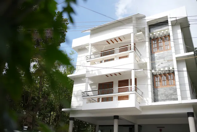 WHITE PORTICO THEKKADY