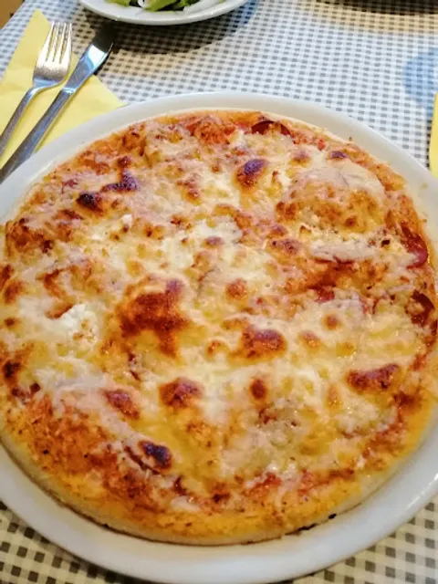 Pizzeria Angelo - Nirmal Singh