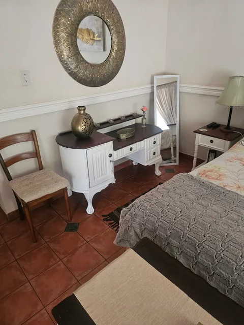 Roses and Pebbles B & B Guest House