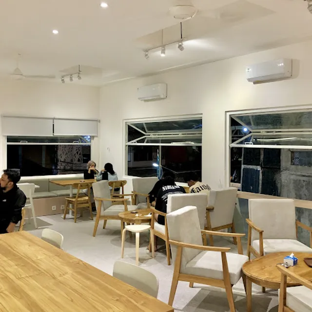 Titik Koma Siwalankerto