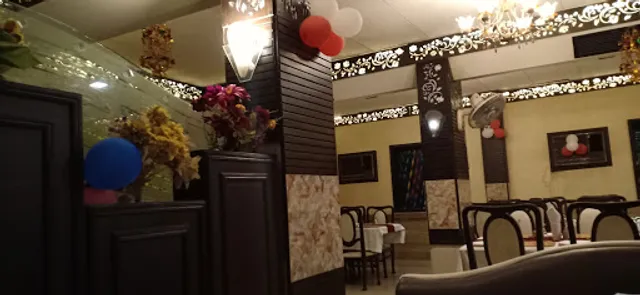 Harmony's Restaurant Veg RoofTop, Hotel Santoor