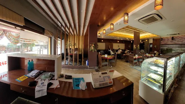 Pream sweets and veg restaurant