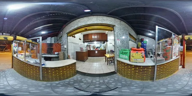 Surreal pizzaria e esfiharia