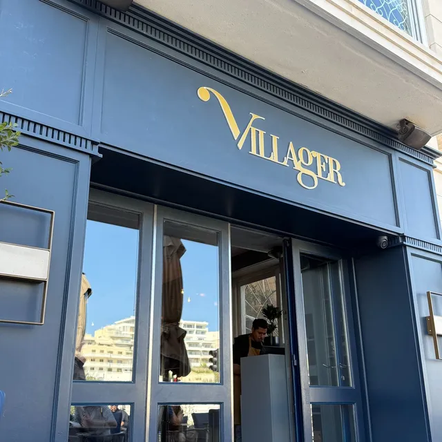 Villager by Munchies Mellieha