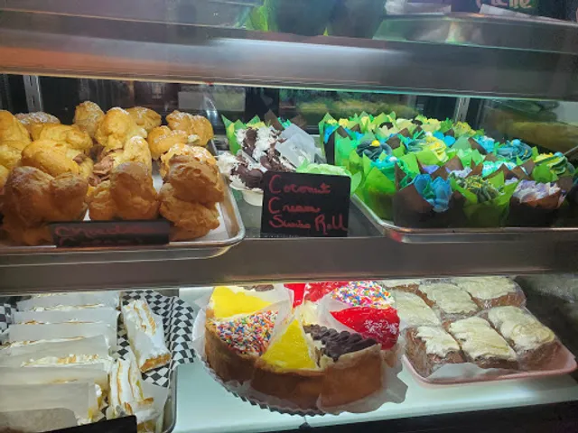 Fluffing Feathers and Flour Bake Shop