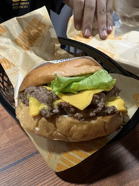 Buddy Burger, Timika