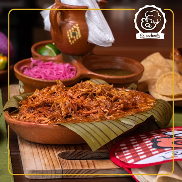 La cochinita con mare Suc. Las torres