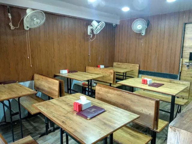 New Cafe Deluxe Hotel