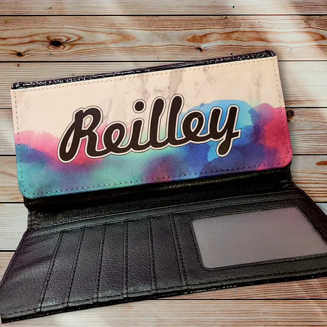 Visions of Q Studio (Custom Apparel Studio)