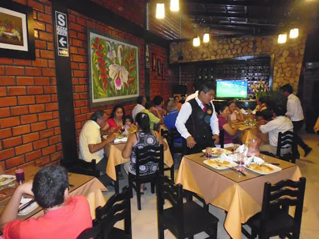 El Trinchero Carnes y Tacachos