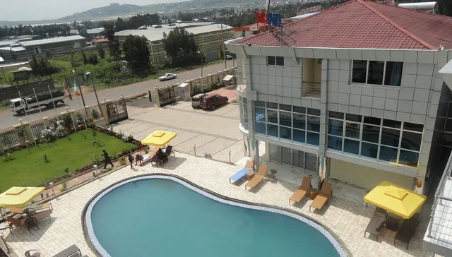 Hadmes Hotel | Alem Gena | ሐድሜስ ሆቴል | አለም ገና