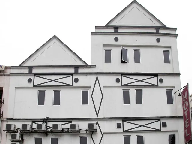 OYO 143 Swan Cottage Hotel