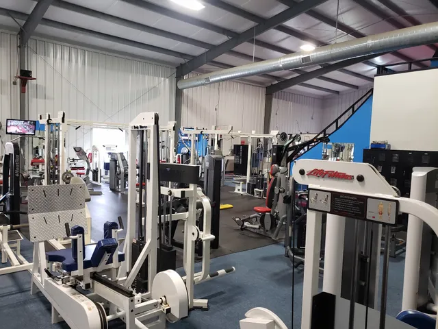 Cosmos Fitness & Tanning. Open 24 Hrs.