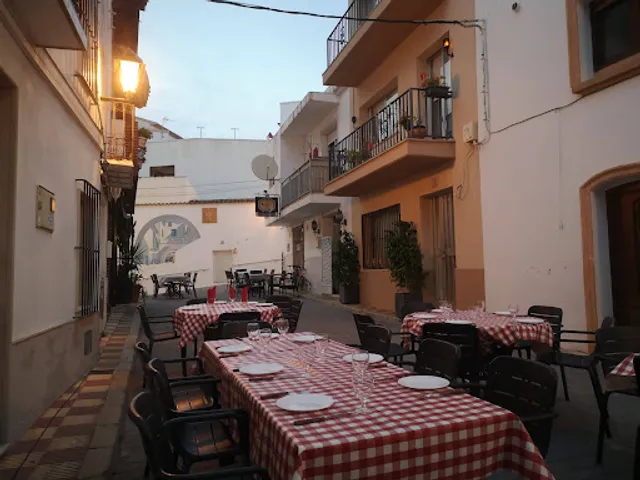 El Santo PIZZERÍA Steak House.