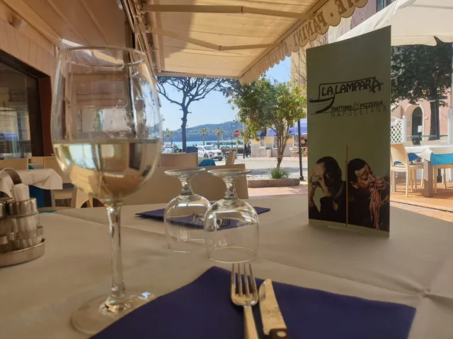 Trattoria & Pizzeria LA LAMPARA Portoferraio Pizza NAPOLETANA RISTORANTE DI PESCE anche senza GLUTINE e DA ASPORTO all'Elba