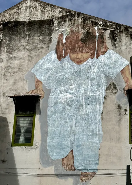 Girl in Blue mural by Ernest Zacharevic