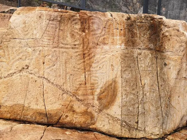 Rock Carving at Big Wave Bay