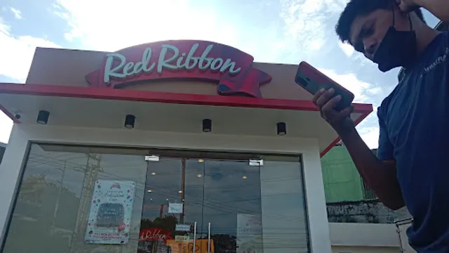 Red Ribbon | Solis-Abad Santos