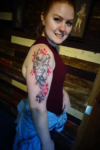 Silver Tuna Tattoo and Piercing