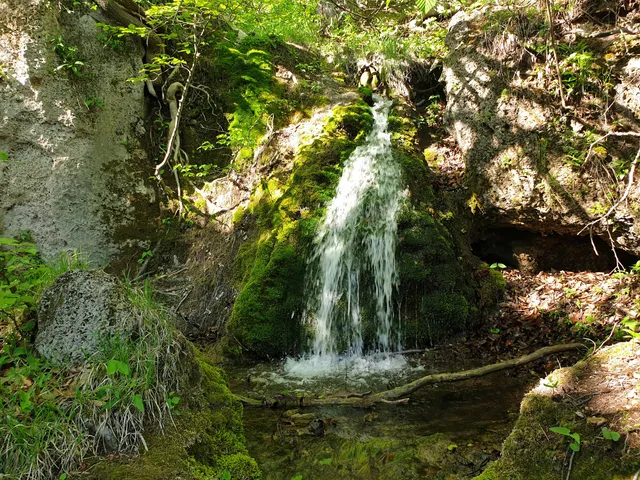 Waterfall and a cave "Futula"