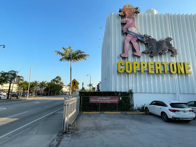 Coppertone Girl Sign