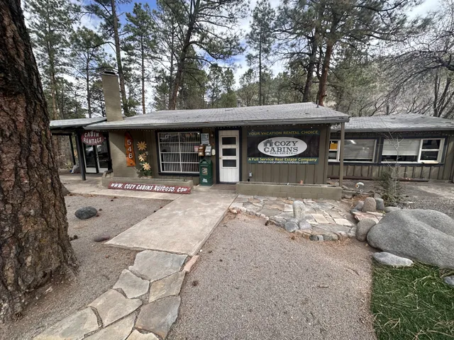 Cozy Cabins Real Estate dba NM Homes & Land