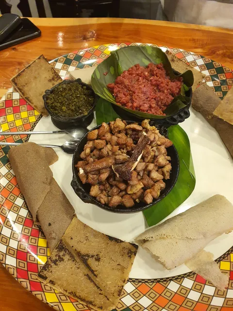 አንዋር የሀገር ቤት Tibs & Kitfo ጥብስ ክትፎ ቤት