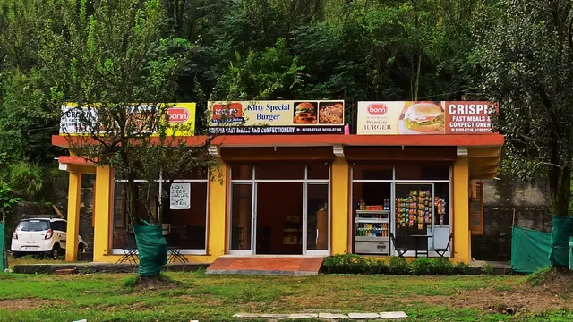 Crispia Fast Meals and Confectionery Opposite main gate nature park Babeli
