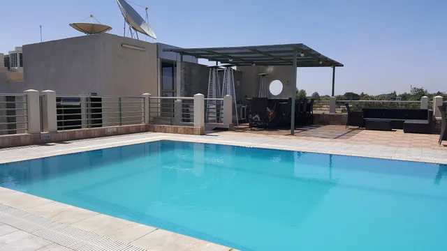 Magna Hotel & Suites