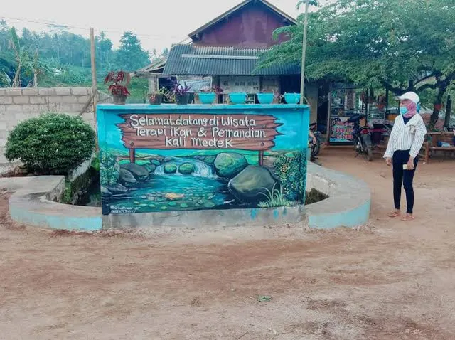 WISATA TERAPI IKAN kali medek