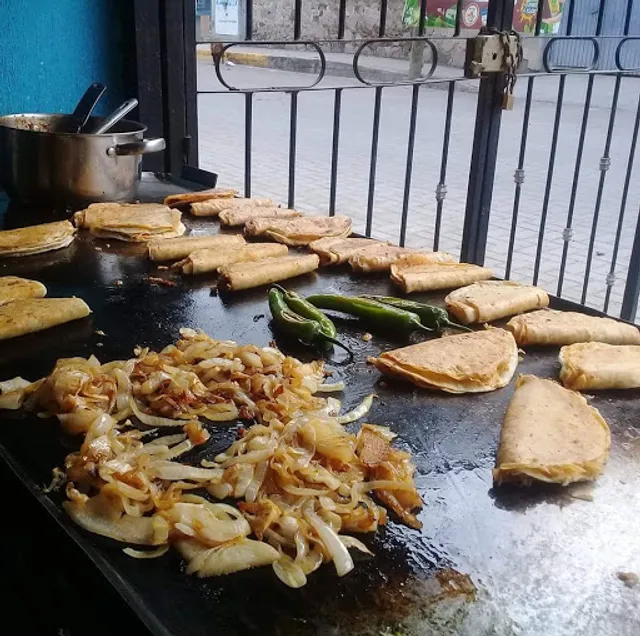 Menuderia González".