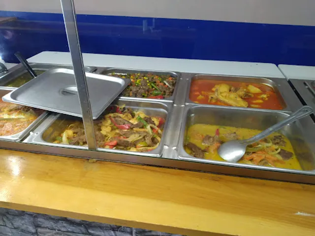 Pupusería El Pulgarcito de America