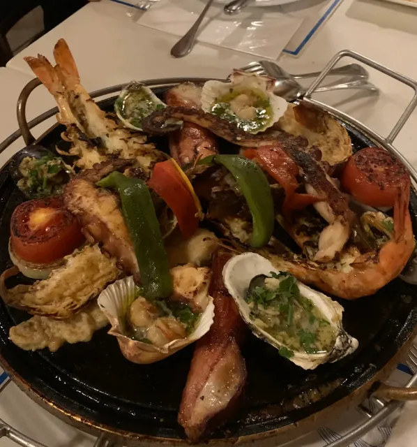 Around São Paulo 🇧🇷 | Restaurant in Guaruja · Rufino's