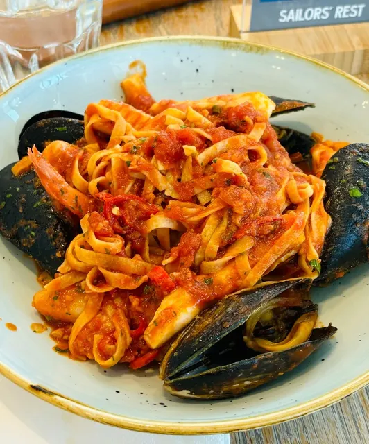  Where Italian Meets Spanish with a Waterfront View! 🌊🍝