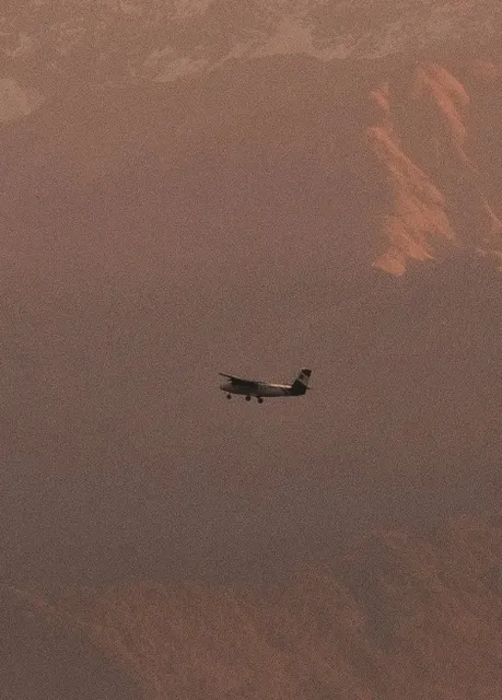 ✨ Standing in the clouds, watching the snow-capped mountains wake