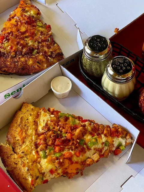 Calgary's Legendary "Bigger Than Your Face" Slices!