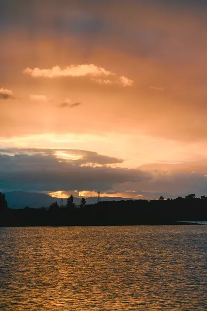  Sitting on the grass, watching the sky turn red little by little