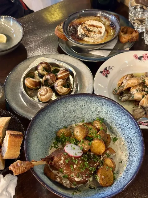 since we’re here, let’s try that French escargot and confit duck.