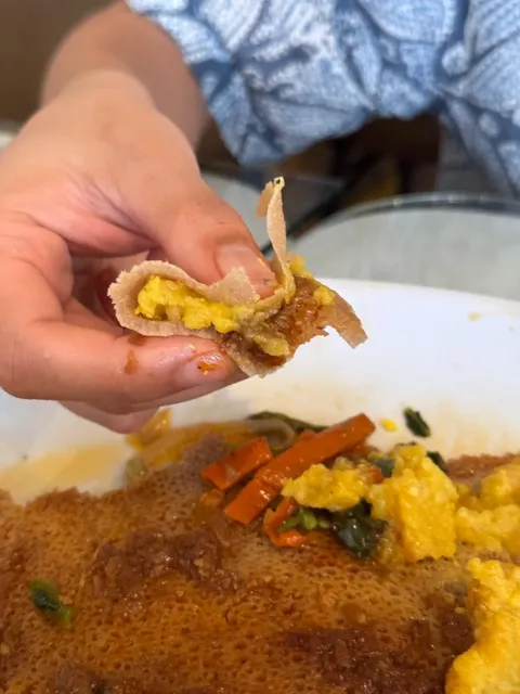 You Can’t Use Your Phone While Eating Ethiopian Food 😲