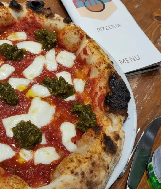 Delicious pizza in the city center.