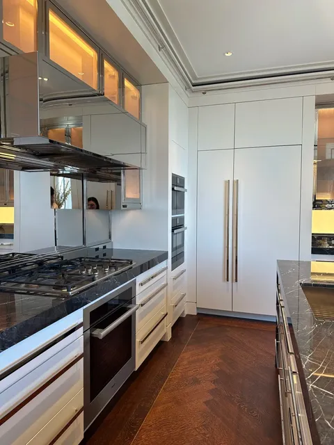 I was playing cards at 220 Central Park with the old money elite.