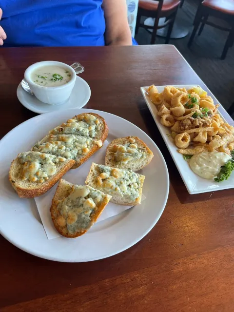 🌅 Great Views & Delicious Food – A Winning Combo! 🦑