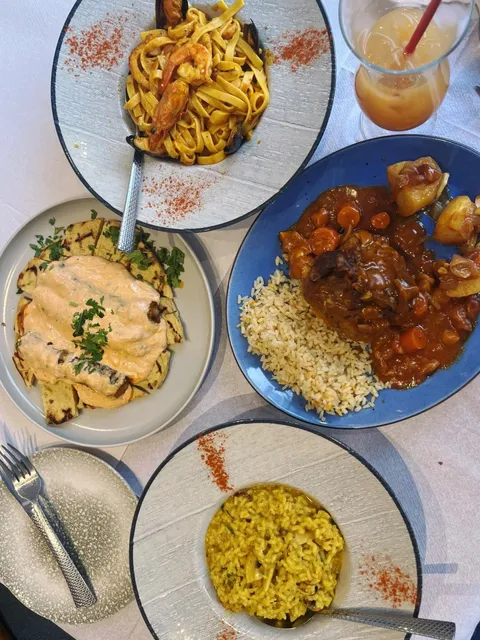 Santorini's Traditional Greek Flavor Restaurant with Generous Portions