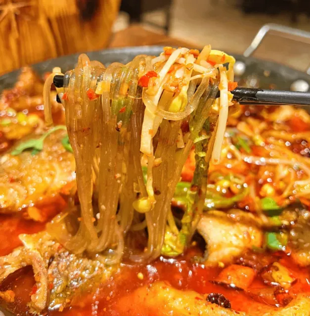 Manhattan, New York | My family is boiling live fish in this pot‼