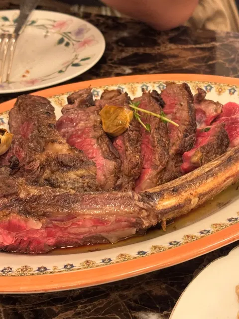 Poèmes | One of the Best Tomahawk Steaks in Paris