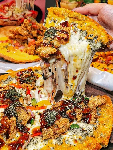 It's still too ahead of the curve, a bite of the ultra-thick cheese fried chicken pizza is an eternity in a moment